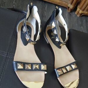 Isola Black Sandals with Gold Stud Accents